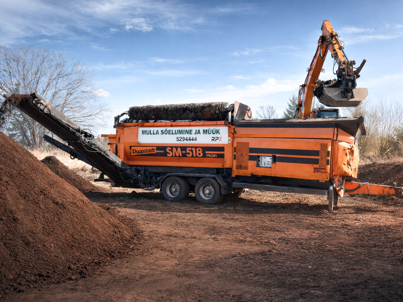 Doppstadt SM-518 trummelsõel mulla sõelumisel